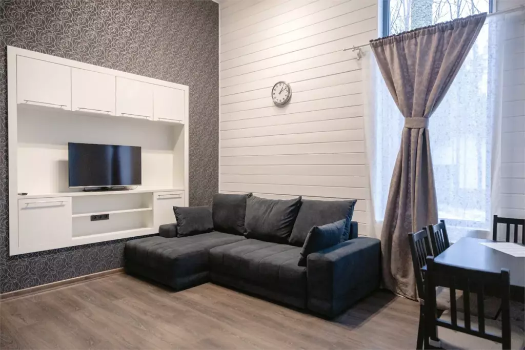 Скандинавский коттедж 70 м² с двумя спальнями и сауной до 6 гостей: гостиная