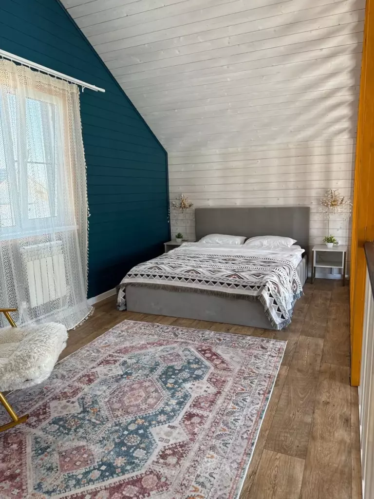 Барнхаус «Фландер» 60 м² с купелью и двором 6 соток до 4 гостей: спальня