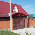 Дом для отдыха в Белорецке, общий вид: дом за воротами