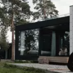 Ландшафтный отель EDER Vuoksa в Мельниково, общий вид: дом с очагом у террасы
