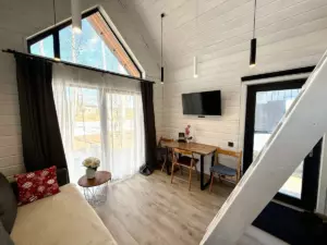 Barn Medium с гостиной, спальней на втором этаже и видом на реку до 4 гостей