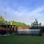 Гостевой дом NS house в СНТ Садовод-1, общий вид: двор с бассейном и навесом