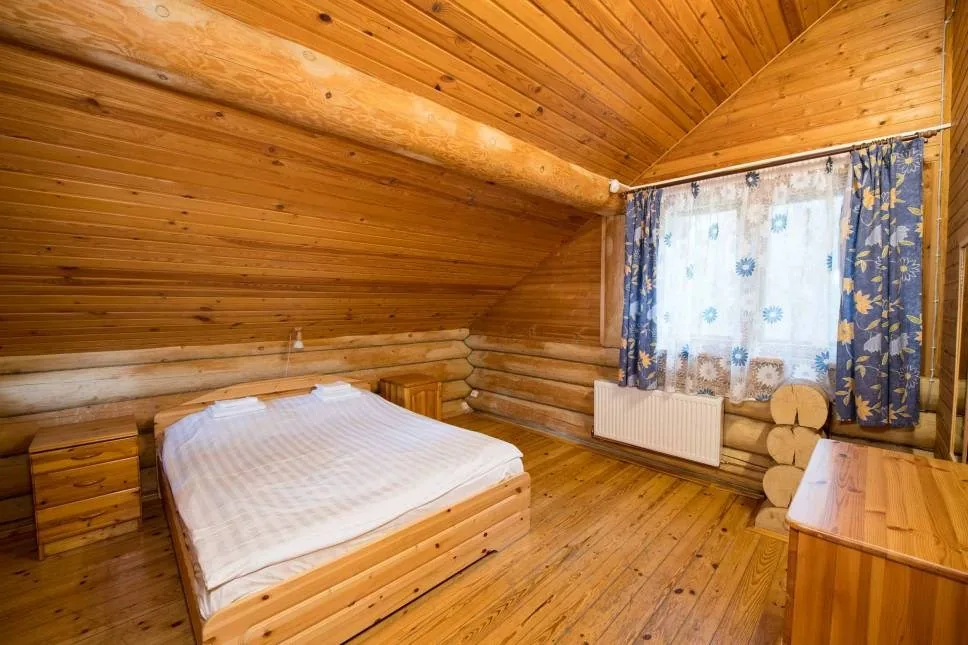 Коттедж «Дом Нептуна» 209 м² с камином и сауной до 8 гостей: спальня